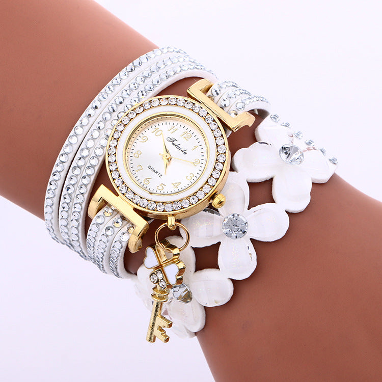 wish AliExpress foreign trade hot sale Women's winding watch alloy diamond four flowers Korean velvet bracelet watch