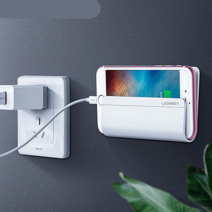 Mobile phone charging wall bracket