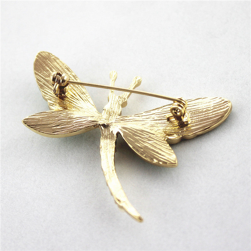 Green dragonfly pin