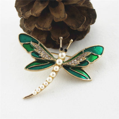 Green dragonfly pin