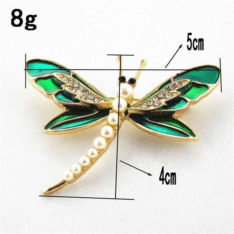 Green dragonfly pin