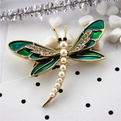 Green dragonfly pin