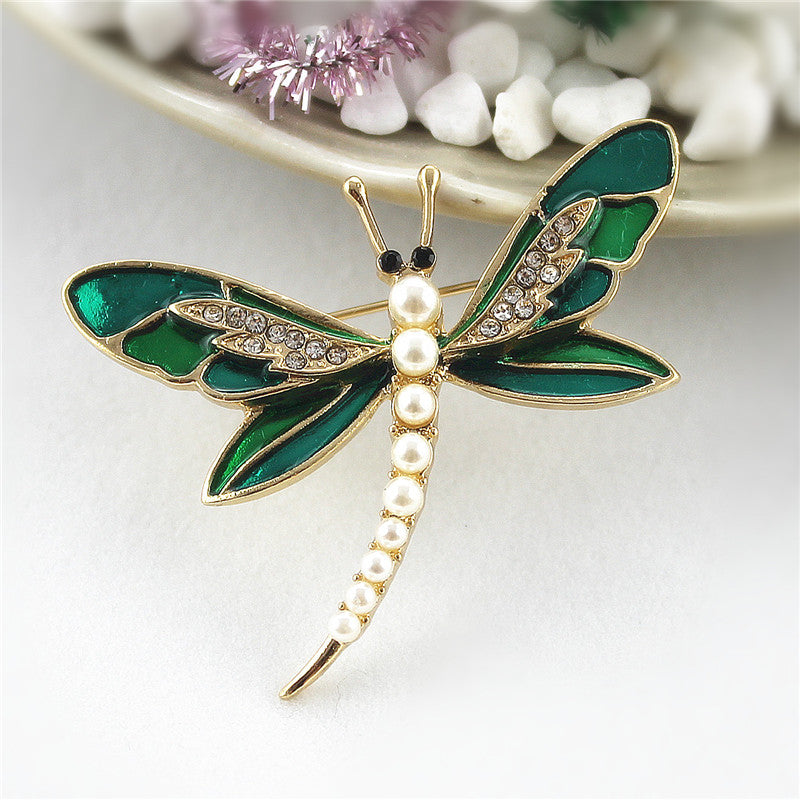 Green dragonfly pin