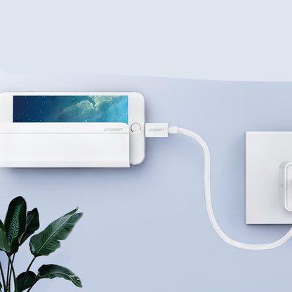 Mobile phone charging wall bracket